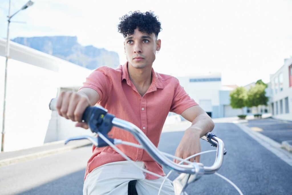 How to reduce carbon footprint as a student - By riding a bicycle like this young man